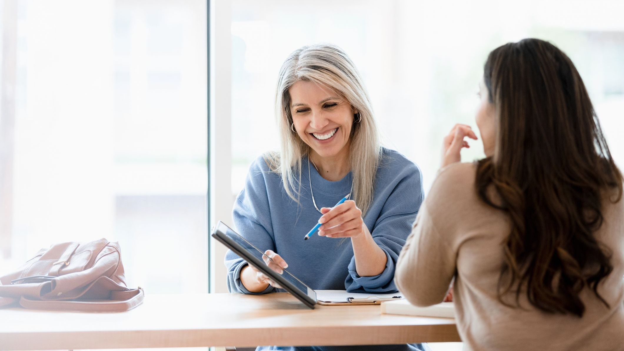 A financial advisor meets with a new client.