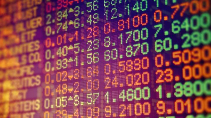 An electronic stock market data board shows stock prices in real time.