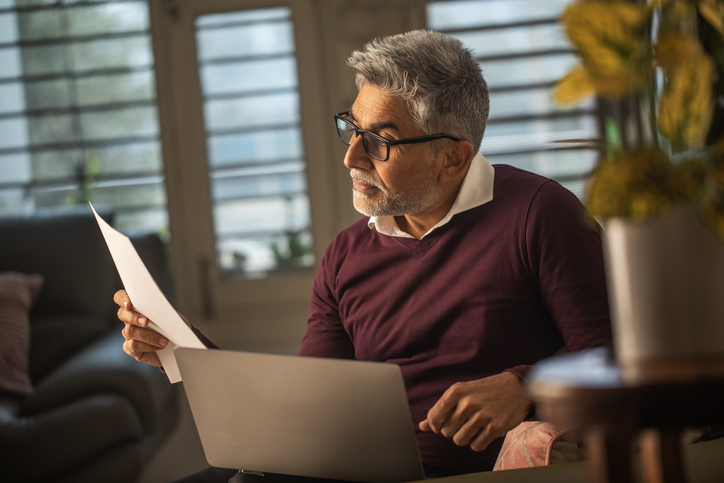 A man reviewing an advance healthcare directive.