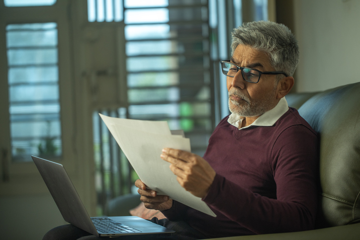 A senior looking over an estate plan.