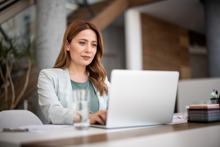 A woman reviewing her financial investments.