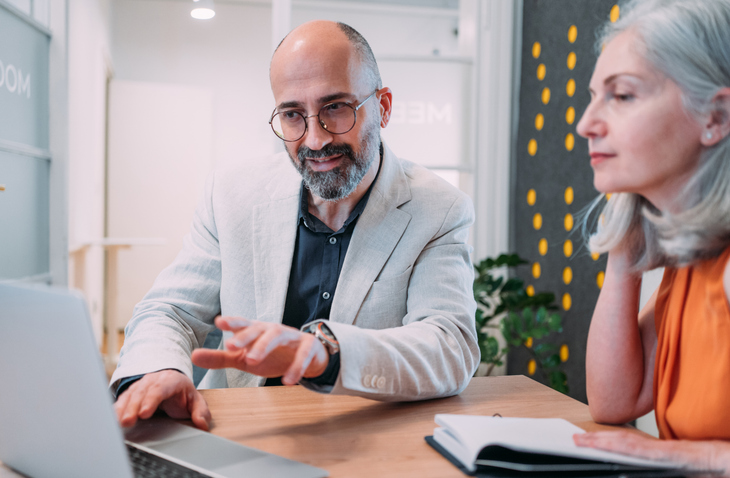 A couple researching estate planning strategies to minimize or avoid probate.