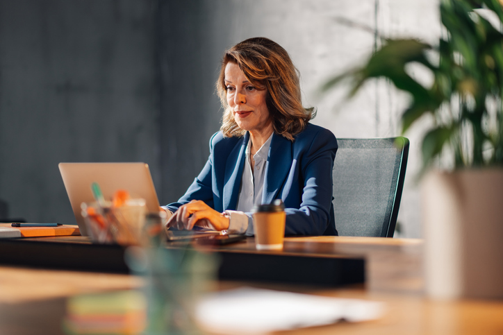 A woman reviewing investments for her retirement plan.