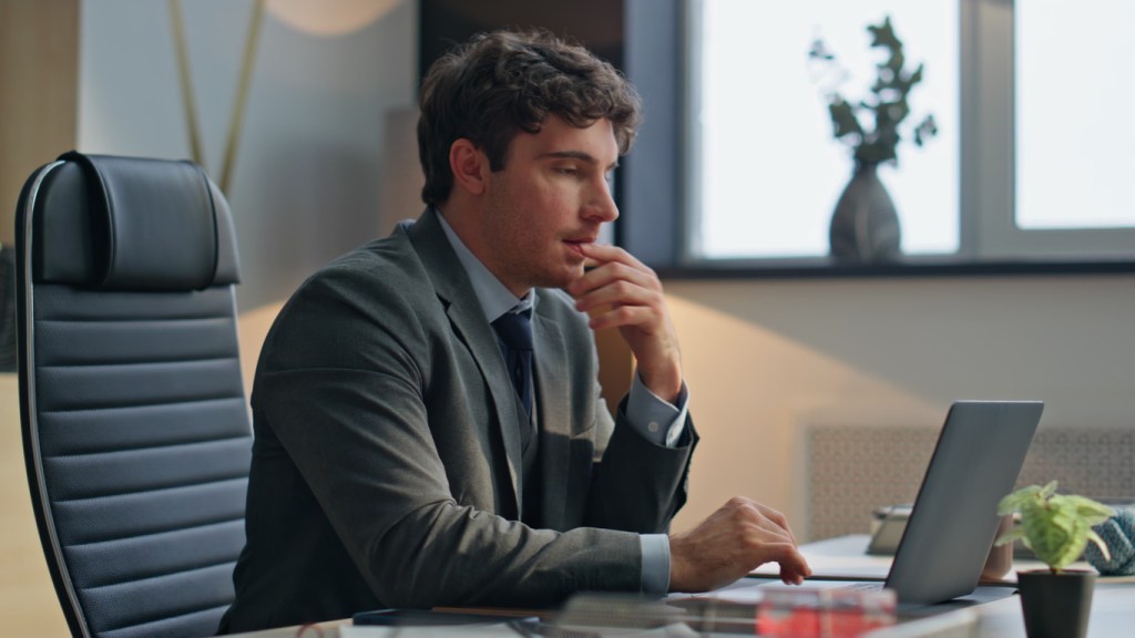 An investor reviewing data for an investment.