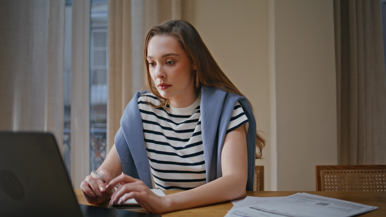 An investor reviewing different types of fiat money.