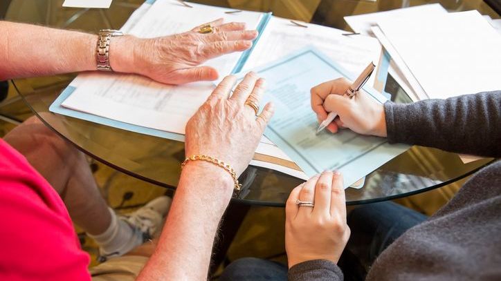 A couple overs over their estate planning documents together and creates a codicil to their will.