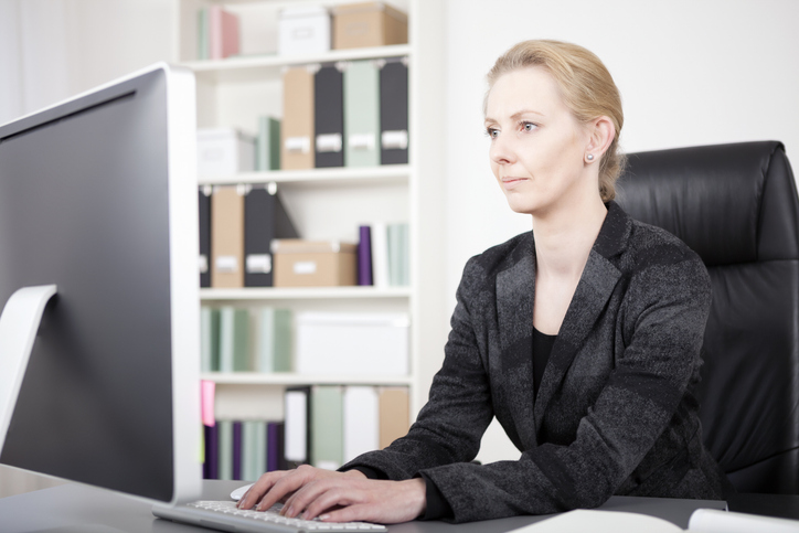 An investor reviewing the performance of her stocks.