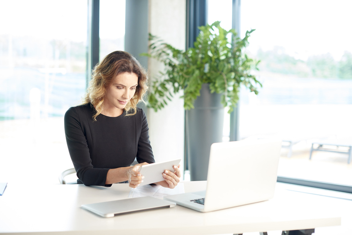 A woman looking up beneficiary rules.