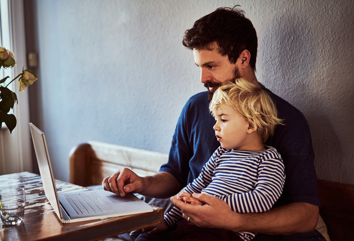 A father looking up the rates, limits and rules for the kiddie tax.