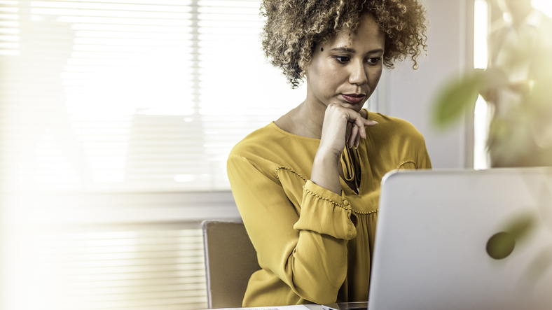 A woman researching different powers of attorney in Georgia.