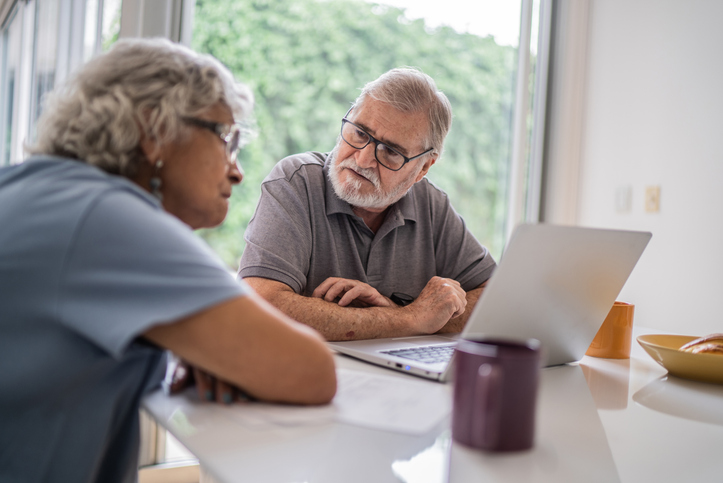 A senior couple discusses their estate plan.