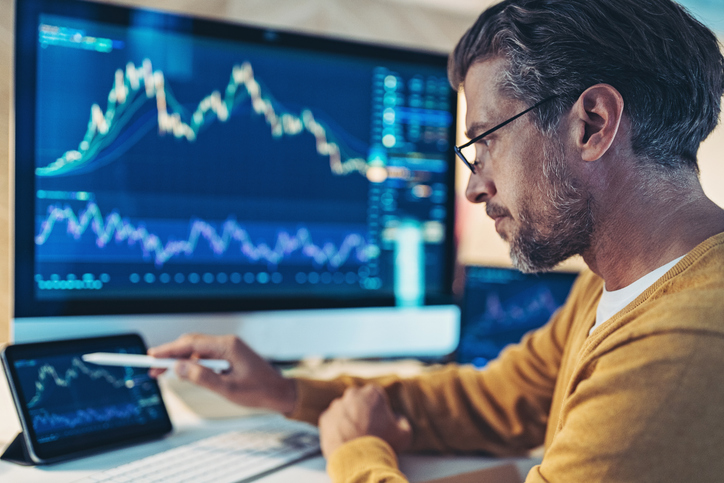 An investor analyzing investments.