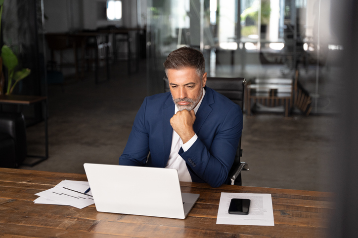 An investor considering the pros and cons of buying on margin.