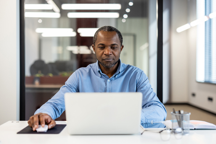 An investor researching how stock prices are determined in real time.