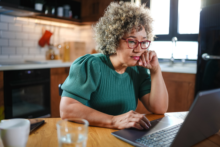 A woman reviewing changes made to her estate plan.
