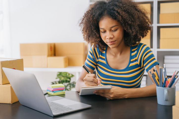 A woman creating a financial plan.