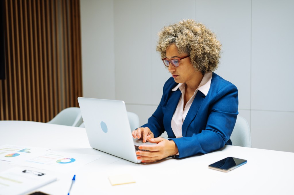 A woman deciding whether to switch her financial advisor.