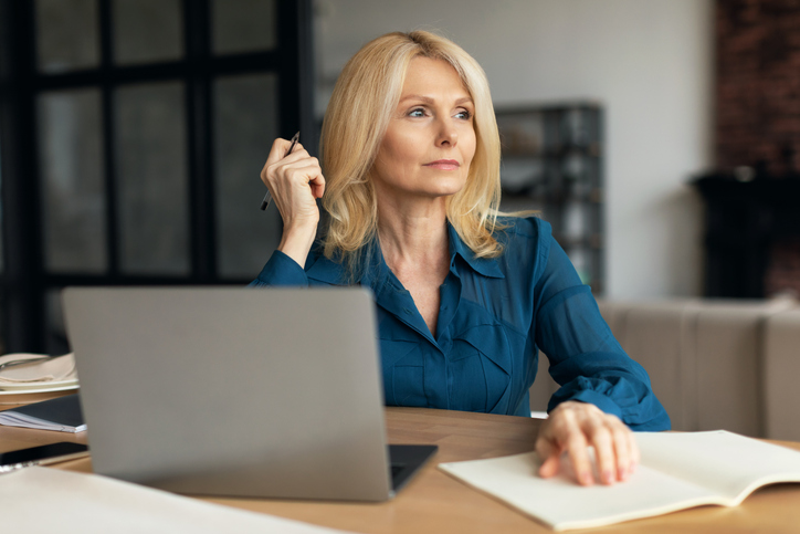 A woman going through a divorce thinking about dividing tax debt.