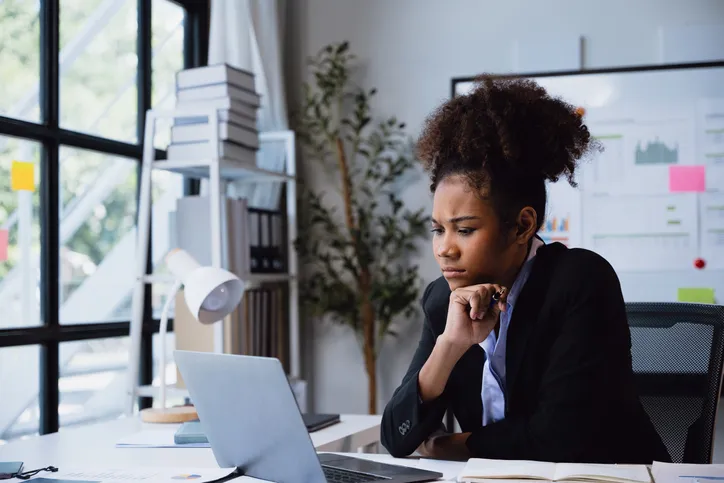 A woman looking up reserve requirements.