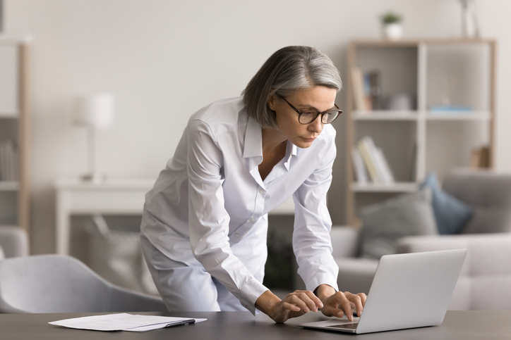 A woman researching tax laws for divorce settlements.