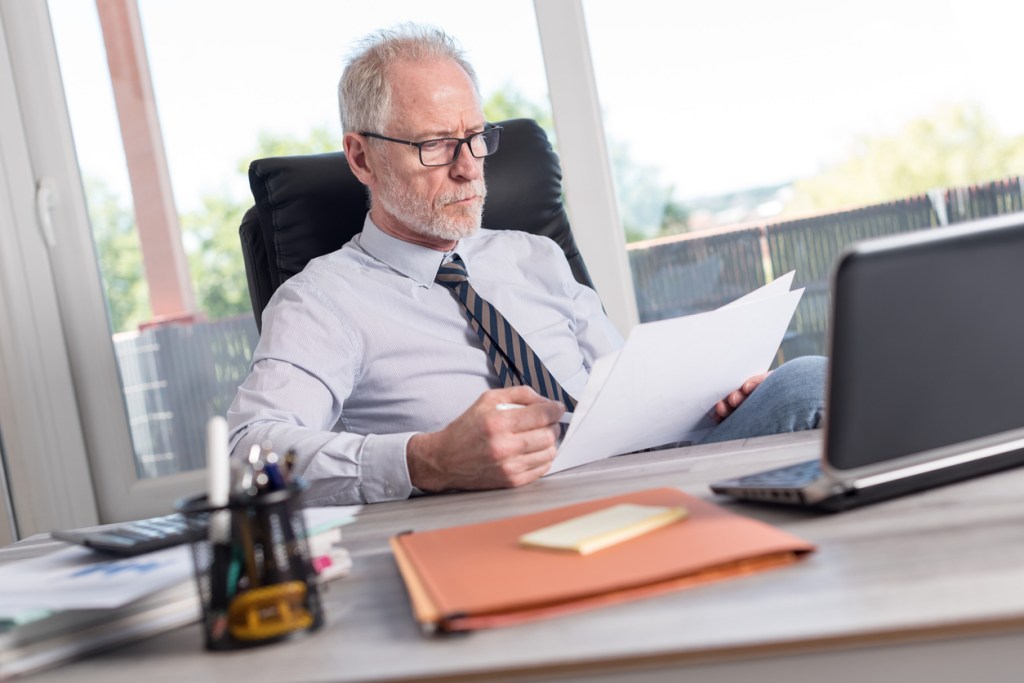 A man reviewing a power of attorney.