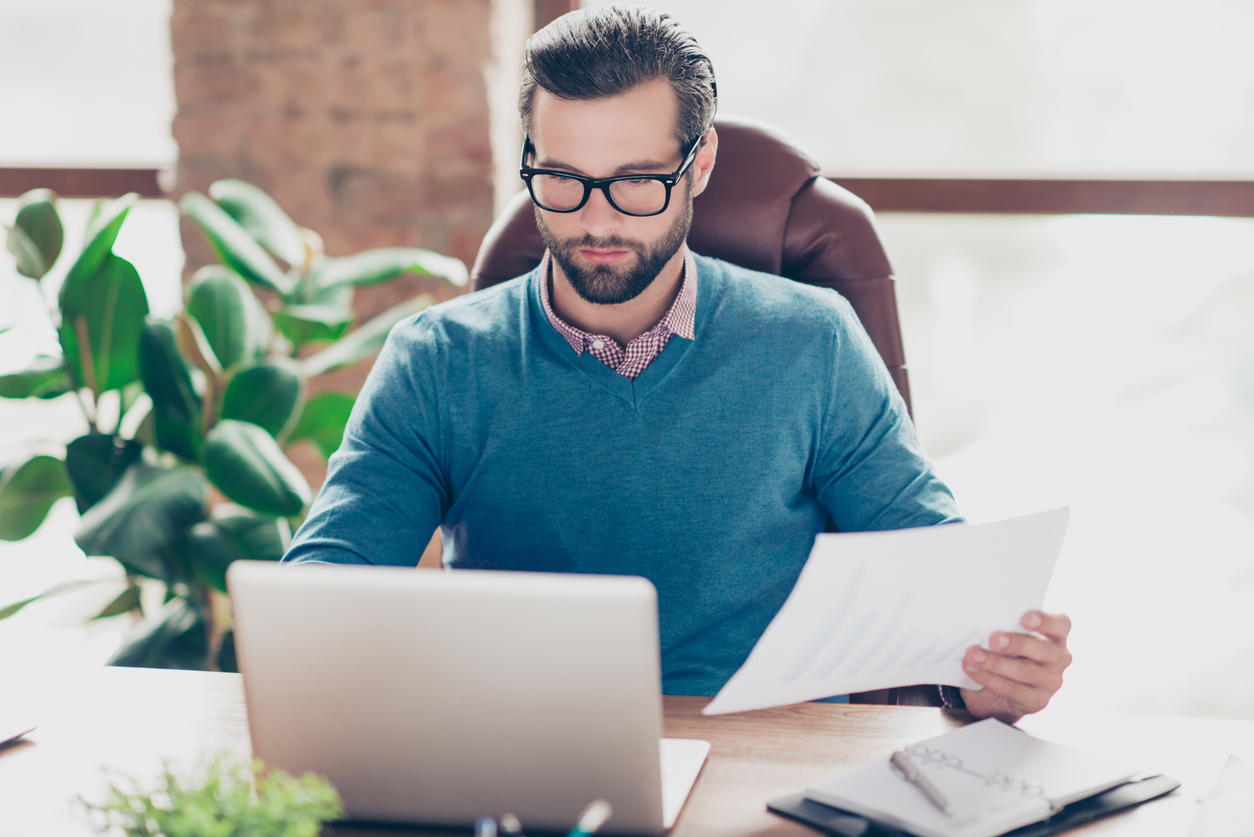 A taxpayer reviewing form W-8BEN.