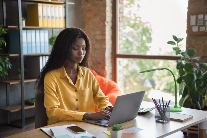 An investor reviewing her investment portfolio.