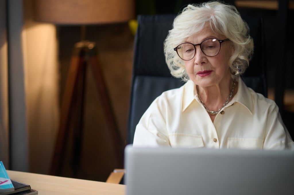 A senior making adjustments to her retirement plan.