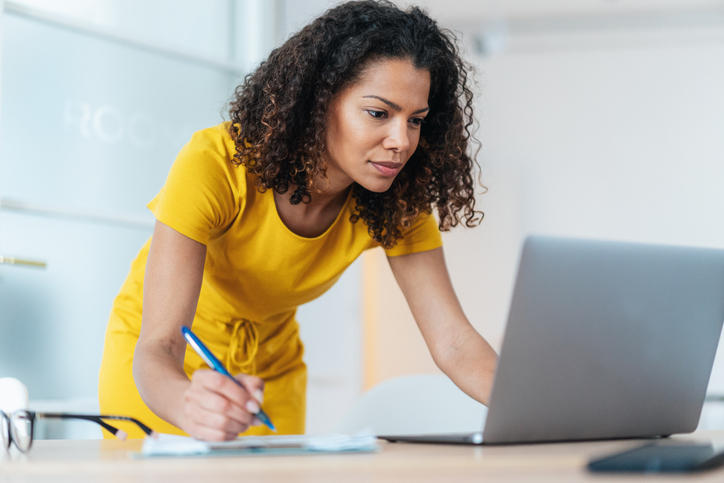 An investor making adjustments to her investment portfolio.