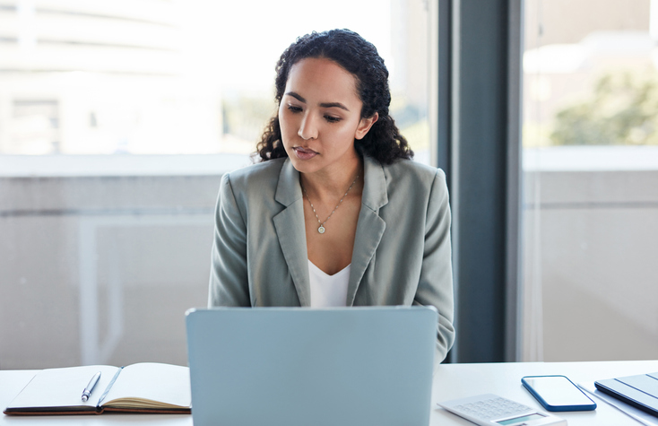 A business owner reviewing a strategy to protect her business from tariffs.