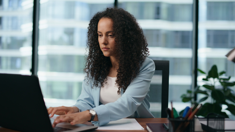 An investor reviewing her investment portfolio.