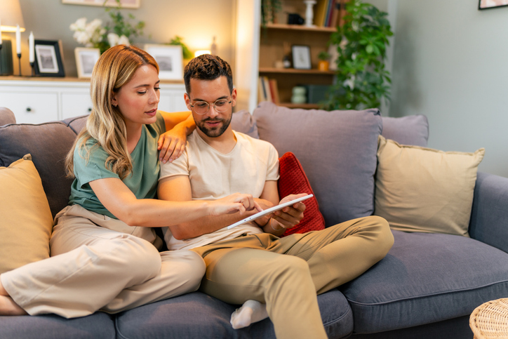 A couple researching how encumbrances could affect the value of a property.