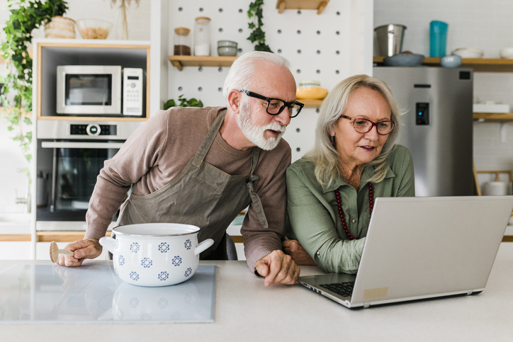 A senior couple researches different powers of attorney in Ohio.