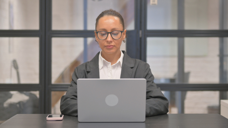 An investor reviewing her investment portfolio.