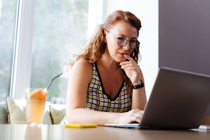 A woman researching how to fund a trust.