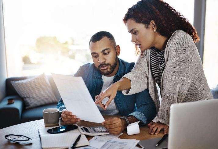 Real estate investors calculating the effective gross income (EGI) for an investment.