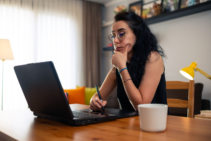 A union worker checking whether her state considers union dues tax-deductible.