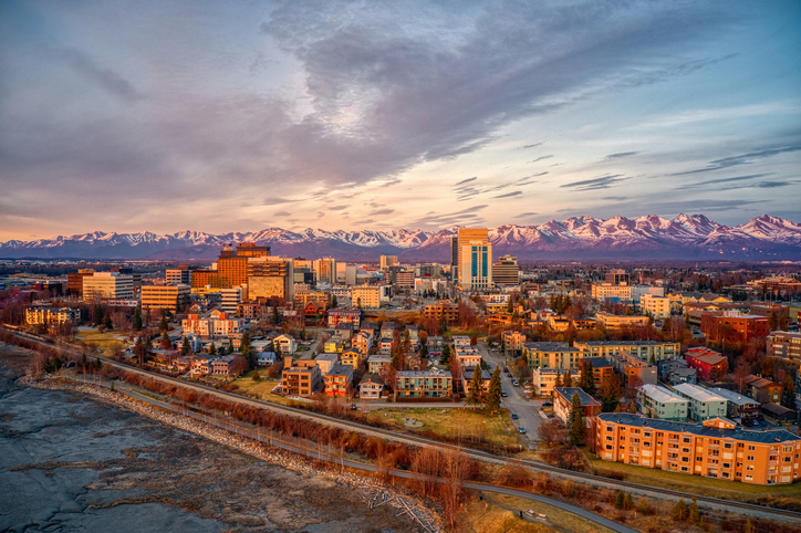 An aerial view of a sunset over Downtown Anchorage, Alaska.
