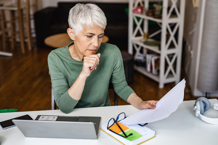 An investor comparing tax differences for REITs and dividend stocks.