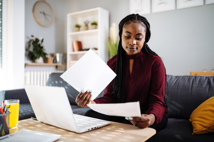A woman deciding whether she should invest in a 401(k) without matching.