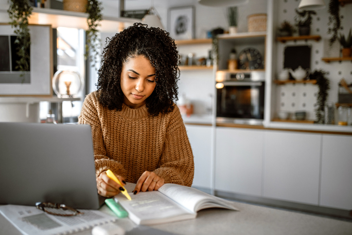A baby bond investor reviewing her investment portfolio.