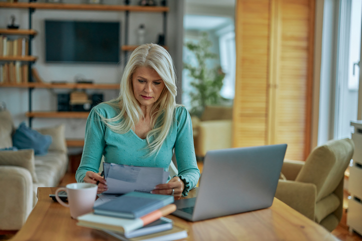 A woman looking up ways to avoid the mansion tax in new York.