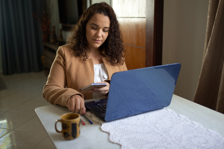 An investor reviewing her investment portfolio.