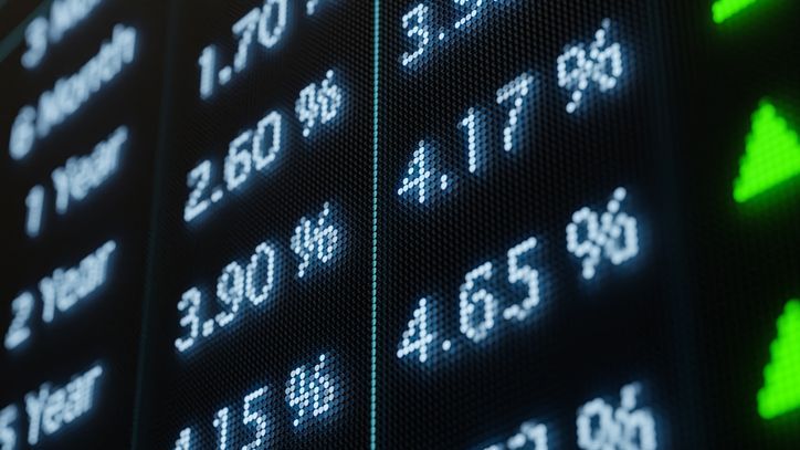 A digital screen showing bond yields.