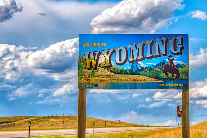 The iconic "Welcome to Wyoming" sign along the border between Colorado and Wyoming.