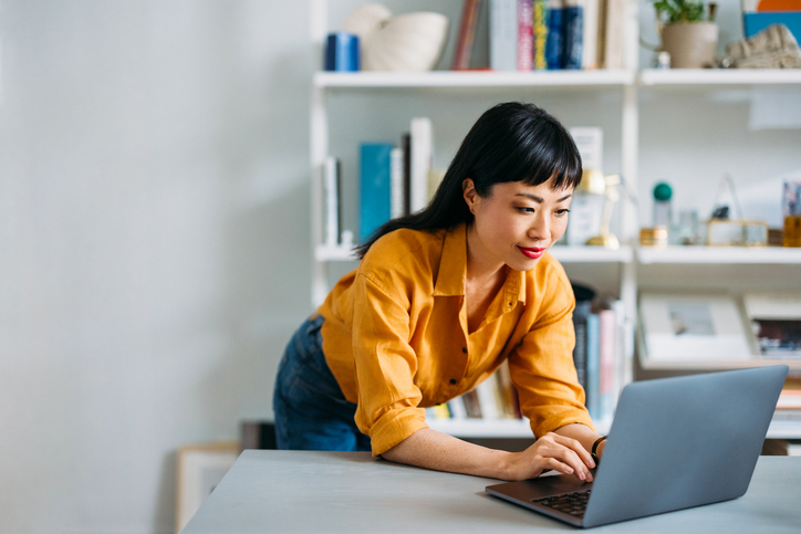 A woman researching where she can invest in bearer bonds.