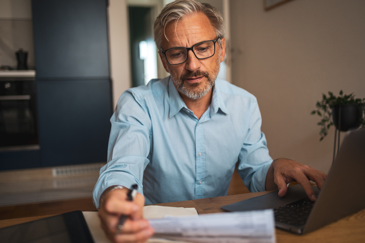 A man filing his taxes in Florida.