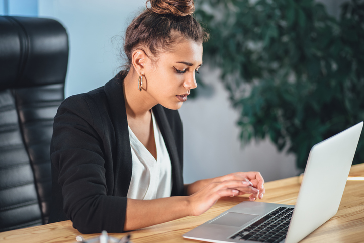 A financial advisor reviewing a tax plan for a corporation.