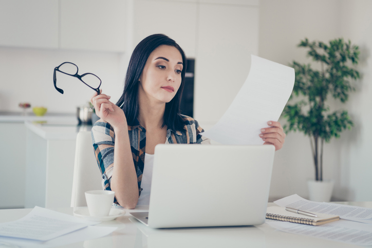 A taxpayer reviewing documents for her taxes.