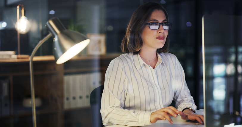 A woman reviewing her retirement portfolio.